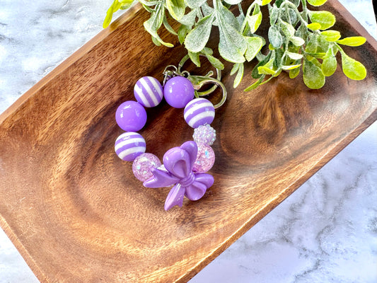 Purple Bow Bubblegum Bead Wristlet